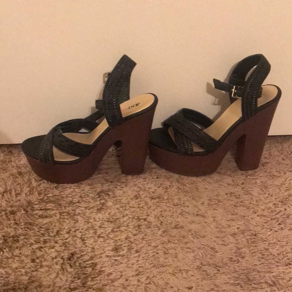Platform sandal. Never worn.